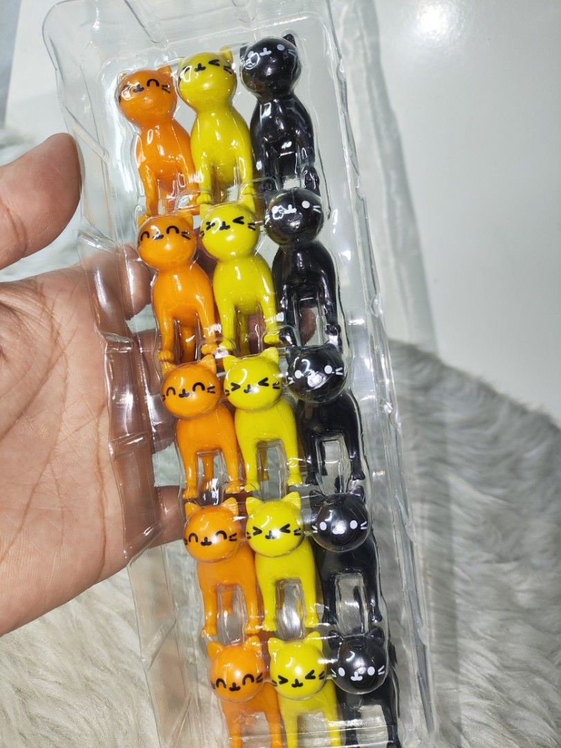 Cat-astrophe Stacking Cats Game (Category: Board Games & Puzzles) located in Cavite. Submitted by tinetaclesss (Listing ID 1469548949, Image 3). Description: - Fun cat-themed stacking tabletop game - Includes miniature cat figurines in orange, yellow, and black - Comes with original box and clear plastic tray - 100% complete with all pieces intact - Perfect for cat lovers, collectors, and family game nights.