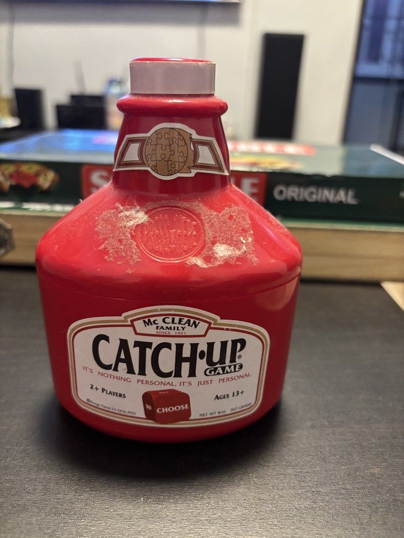 Catch-Up Game Conversation Card Game (Category: Board Games & Puzzles) located in Manila. Submitted by mganovelo64040 (Listing ID 1469482866, Image 1). Description: - Vintage Catch-Up Game by McClean Family (Dated 1921) - Unique and collectible ketchup bottle-shaped container - Includes a deck of conversation cards with both easy and hard prompts - Perfect icebreaker for parties and gatherings - For 2 or more players, ages 13 and up - Condition: 