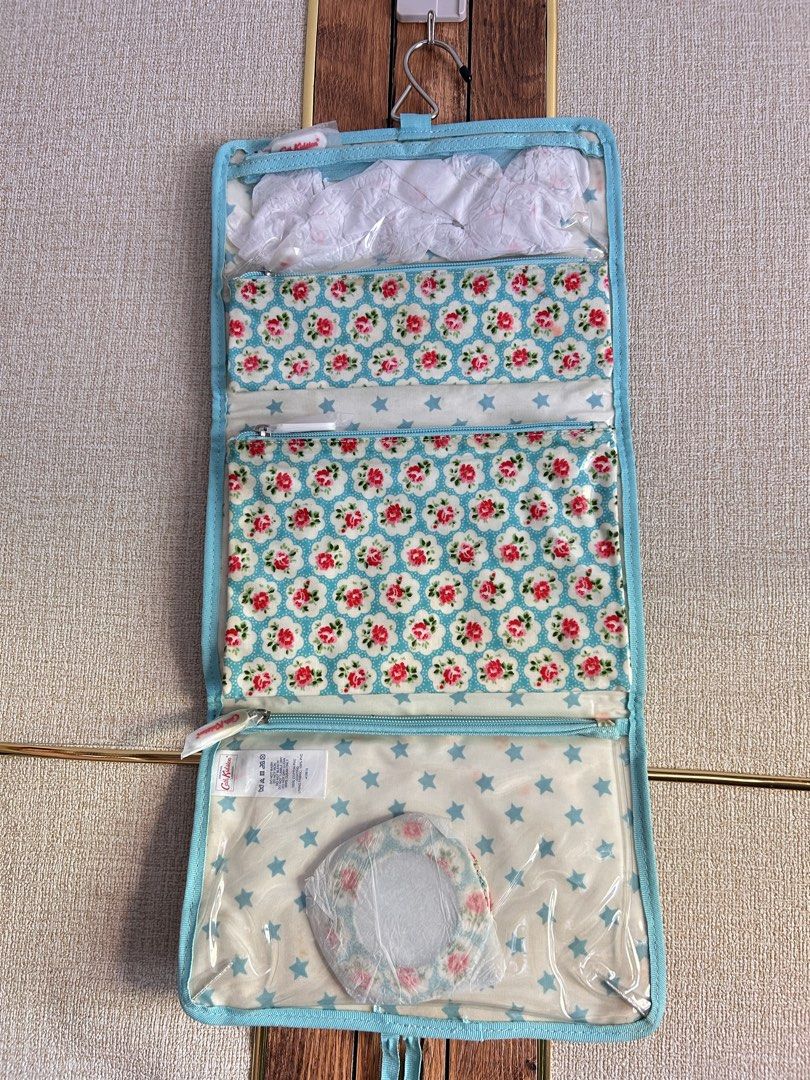 Cath Kidston travel Pouch (Category: Travel Essentials & Accessories) located in Puerto Princesa. Submitted by kanejela (Listing ID 1469432775, Image 2). Description: Brand new with flaw (yellowish- due to storage) With mirror and 2 detachable pouches. .