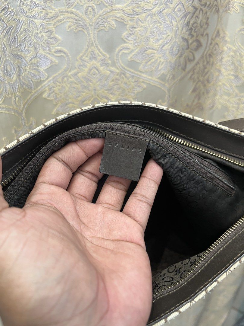 Celine Monogram Shoulder Bag (Category: Luxury Bags & Wallets) located in General Santos City (Dadiangas). Submitted by thiftnibadi3 (Listing ID 1469440127, Image 3). Description: - Authentic Celine shoulder bag - Cream and dark brown C monogram canvas with dark brown leather trim - Secure top zip closure with gold-tone Celine Paris hardware - Fabric-lined interior with all-over Celine branding - Made in Italy with serial number MC01/1 inside.