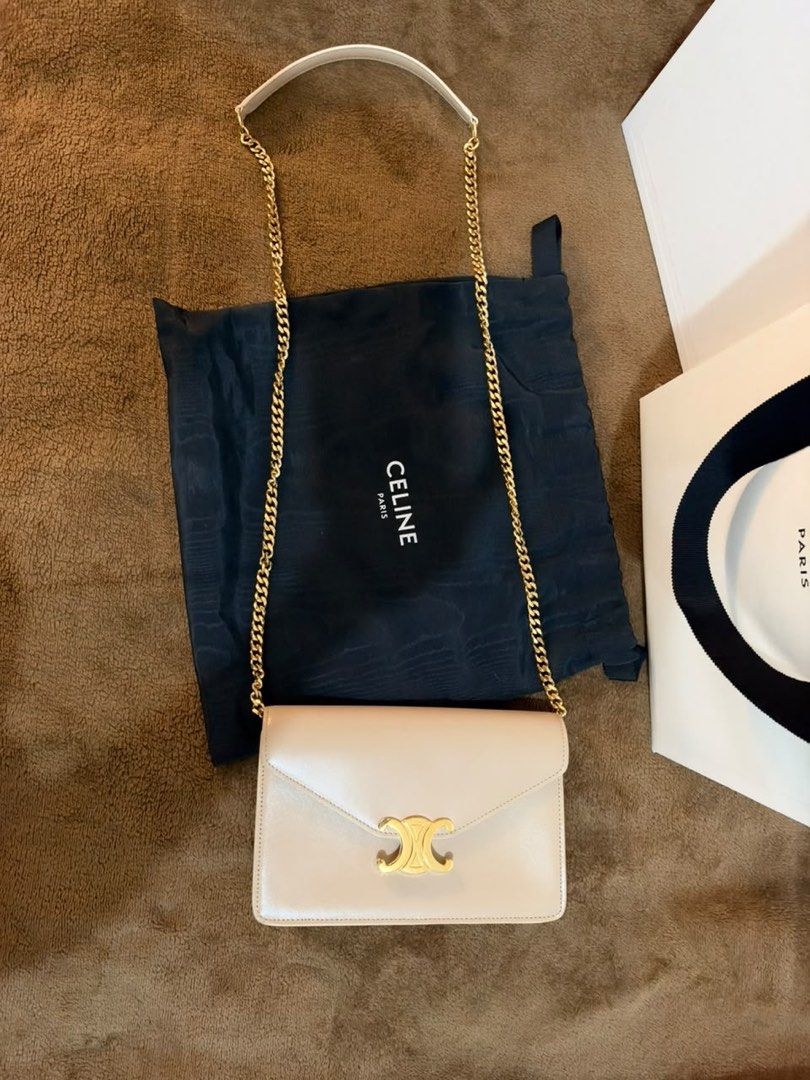 CELINE Wallet on Chain Margo (Category: Luxury Bags & Wallets) located in Manila. Submitted by emceebee (Listing ID 1469450537, Image 1). Description: - Brand: Celine Triomphe Wallet on Chain - Color: Soft neutral beige with elegant gold hardware - Strap: Removable chain strap featuring a comfortable leather shoulder guard - Inclusions: Complete set with original dust bag, store receipt from Osaka Midosuji - care booklets, gift box, and paper sho
