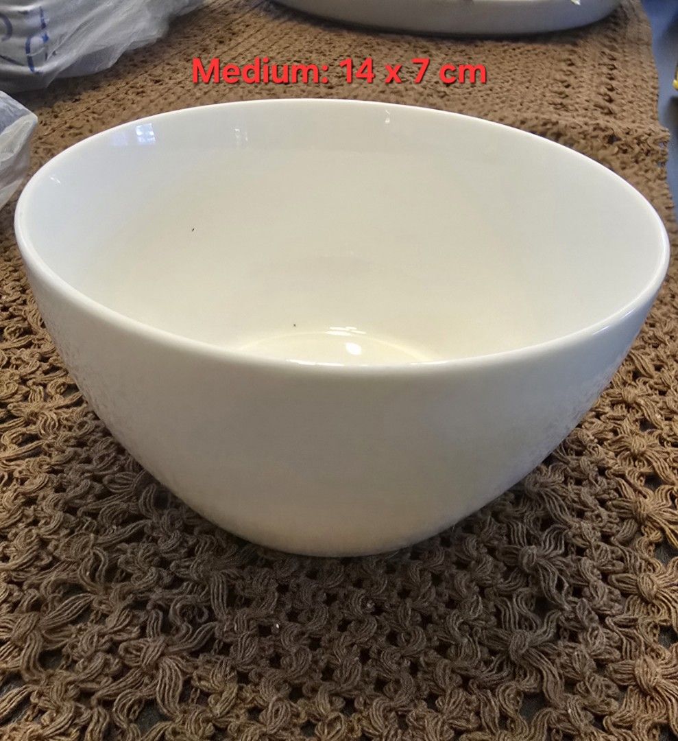 Ceramic Bowl and Dish Set Various Sizes, 9 pcs (Category: Dinnerware & Cutlery) located in Quezon City. Submitted by favestuff (Listing ID 1469413851, Image 3). Description: - Elegant round white ceramic bowls and green square dishes with a smooth glazed finish - Small bowls: 11.5 x 6 cm - Medium bowls: 14 x 7 cm - Green square dishes: 15 x 15 x 6 cm - Sturdy material, perfect for daily meals, snacks, and food serving - No cracks; only 1 pc (medi