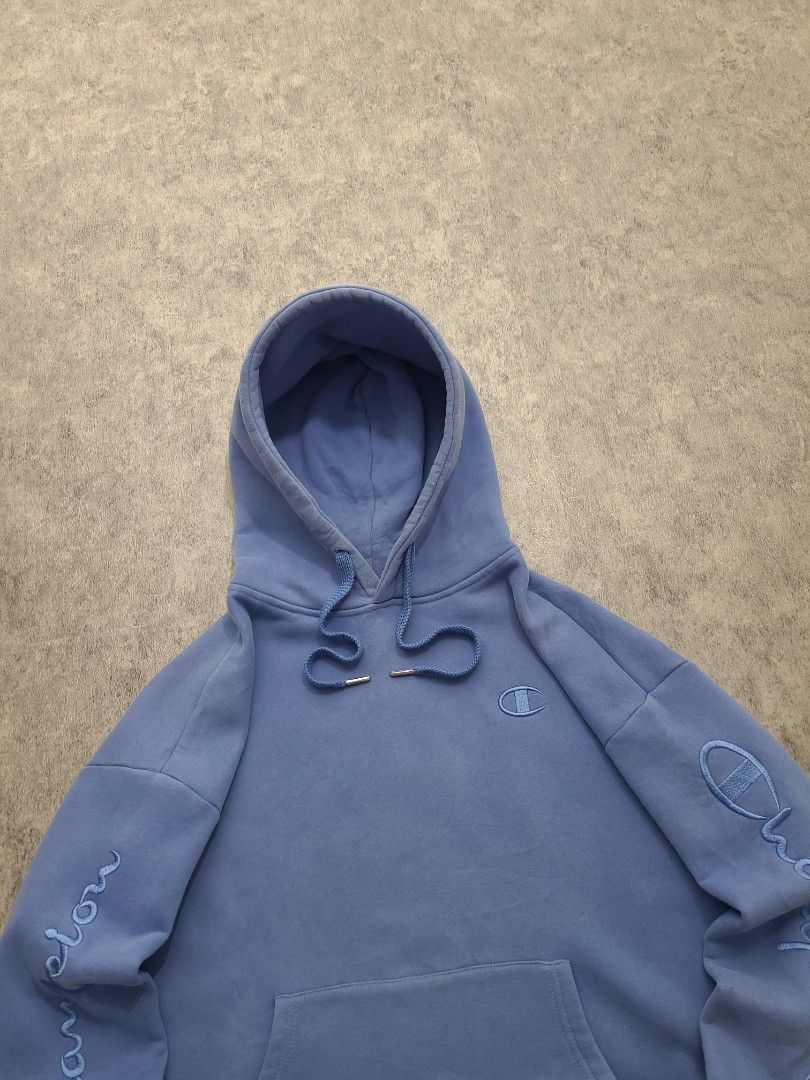 Champion Embroidered Logo Blue Hoodie (Category: Coats, Jackets and Outerwear) located in Quezon City. Submitted by mofinds.ph (Listing ID 1469478021, Image 2). Description: Size: Small on tag Dimes: 25x28 (XL) hanggang 2XL Condition: Excellent/Great condition MOP: BPI DELIVER: LALAMOVE OR J&T MEETUP/PICKUP: Victoria Tower D, Mother Ignacia Ave., Brgy. Paligsahan, Diliman, Quezon City.