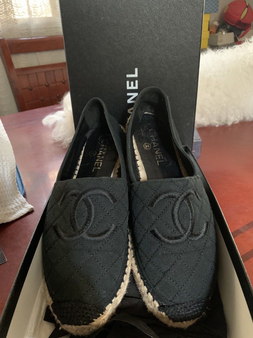 Chanel Black Espadrilles Size 38 (Category: Flats & Sandals) located in Paranaque City. Submitted by declutterby4angels (Listing ID 1469543932, Image 2). Description: - Brand: Chanel - Style: Quilted Fabric Espadrilles - Size: EU 38 - Color: Black with black toe cap - Details: Slip-on design, iconic embroidered CC logo, jute trim midsole - Origin: Made in Spain - Inclusion: Original box, dustbags, authenticity card - Condition: Excellent / Well-m