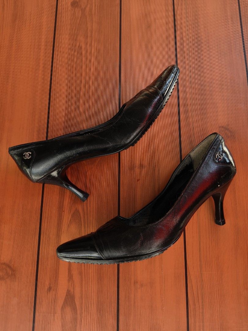 Chanel Black Leather Pointed Toe Heels (Category: Heels) located in Binan City. Submitted by makinpeso0622 (Listing ID 1469446612, Image 2). Description: - Brand: Chanel - Style: Black leather pumps with kitten heels - Size: 36.5 - Details: Pointed toes with CC logo, quilted interior lining, and metallic CC hardware on the heel counters - Soles: Textured rubber soles for extra grip - Condition: Moderate wear visible on the leather and toe tips - 