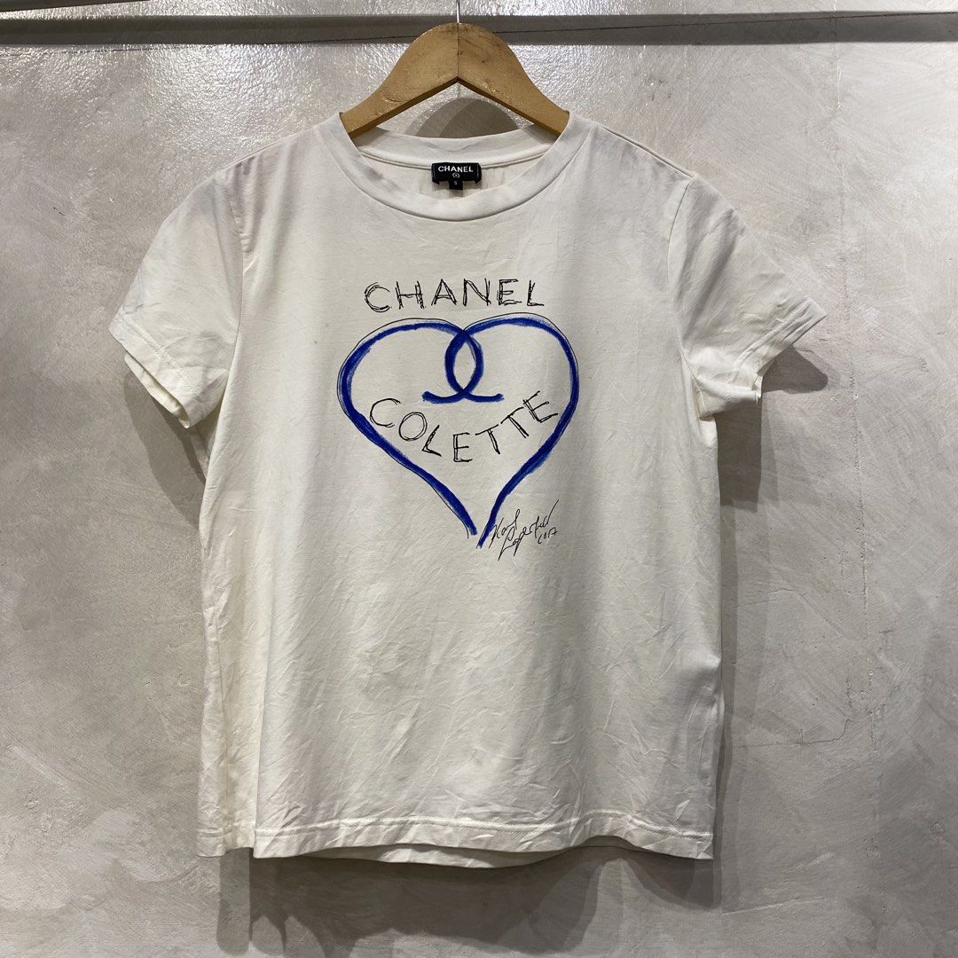 Chanel Colette Shirt (Category: Luxury Apparel) located in Quezon City. Submitted by rebirthalley (Listing ID 1469462551, Image 1). Description: Width-18 Length-22 Sleeve-6 Shoulder-15 Hem-18 Verygood condition Need wash Only.