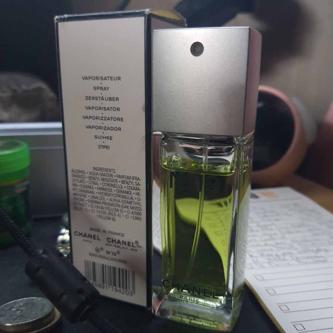 Chanel No 19 Eau de Toilette 50ml (Category: Fragrance & Deodorants) located in Tarlac. Submitted by jajubells (Listing ID 1469427723, Image 2). Description: - Brand/Item: Chanel No 19 Eau de Toilette - Size: 50ml / Vaporisateur Spray - Condition (Bottle): Full and intact - Condition (Box): Original box included with some wear/aging and Japanese import sticker on the bottom flap - Fragrance Profile: Classic green scent with floral and woody notes