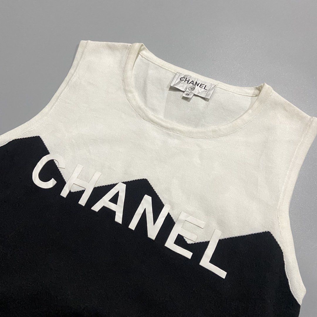 Chanel Paris Black/White Knit Top (Category: Others Tops) located in Cebu City. Submitted by johngregmoldez03 (Listing ID 1469514032, Image 2). Description: Chanel Paris Black/White Knit Top Size: 38 on tag 16 W / 19 L 10/10 Condition 10/10 Color Rate - Need Wash Pm📩.