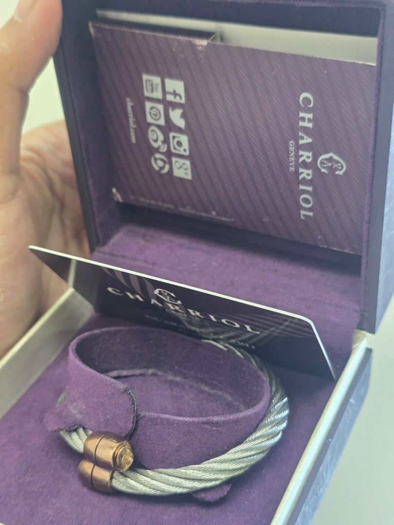 Charriol Celtic Olive/Barrel Bangle (Category: Luxury Accessories) located in Taguig. Submitted by mluxeph (Listing ID 1469477883, Image 2). Description: Charriol Celtic Olive/Barrel Bangle Gender: Ladies Reference #: 04-02-00143 Material: Woven cable in hypoallergenic stainless steel and titanium Bracelet Size: 16cm (inner circumference) / 20.3cm (outer circumference) Inclusion: Original box, guarantee card and care booklets.