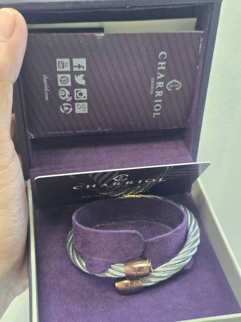 Charriol Celtic Olive/Barrel Bangle (Category: Luxury Accessories) located in Taguig. Submitted by mluxeph (Listing ID 1469477883, Image 1). Description: Charriol Celtic Olive/Barrel Bangle Gender: Ladies Reference #: 04-02-00143 Material: Woven cable in hypoallergenic stainless steel and titanium Bracelet Size: 16cm (inner circumference) / 20.3cm (outer circumference) Inclusion: Original box, guarantee card and care booklets.