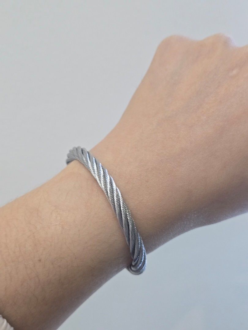Charriol Celtic Olive/Barrel Bangle (Category: Luxury Accessories) located in Taguig. Submitted by mluxeph (Listing ID 1469477883, Image 3). Description: Charriol Celtic Olive/Barrel Bangle Gender: Ladies Reference #: 04-02-00143 Material: Woven cable in hypoallergenic stainless steel and titanium Bracelet Size: 16cm (inner circumference) / 20.3cm (outer circumference) Inclusion: Original box, guarantee card and care booklets.