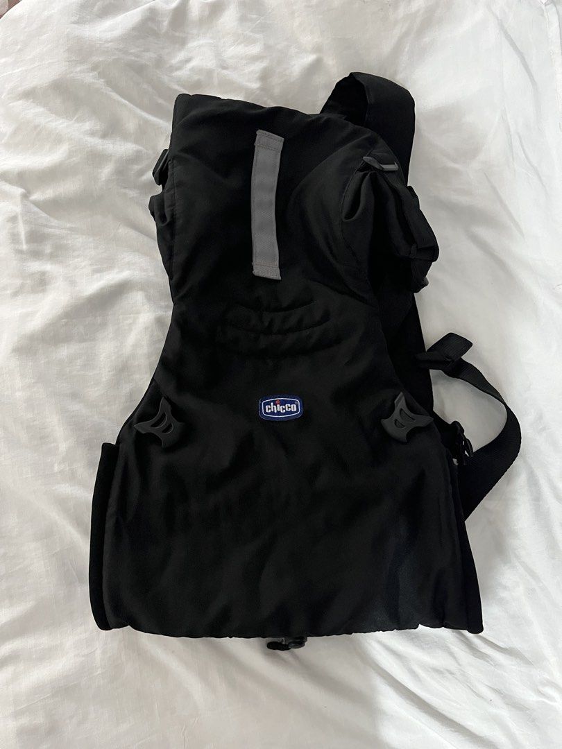 Chicco Black Baby Carrier (Category: Carriers & Slings) located in Manila. Submitted by mariamaria9007 (Listing ID 1466110471, Image 1). Description: - Color: Sleek Black - Brand: Chicco - Ideal for daily use - Adjustable shoulder straps and side buckles for a custom fit - Padded structure with secure clasps for baby's comfort and safety - Clean fabric, sanitized, and ready to use.