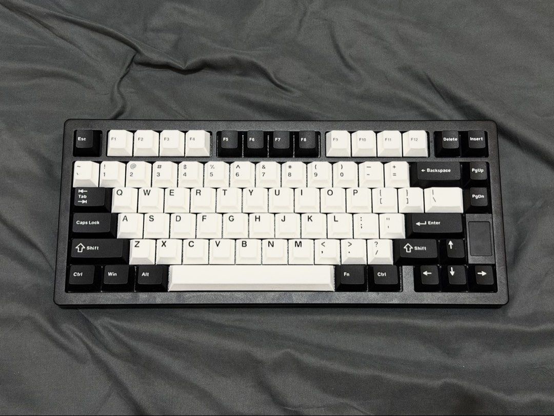 Chilkey ND75 Jet Black Keyboard (Category: Computer Keyboard) located in Bocaue. Submitted by pat.staines (Listing ID 1469557211, Image 1). Description: Small Flaw: LED on letter 'P'. no color red so iba yung nagiging color. works fine pag blue yung lights. Key Specifications & Features: • Layout: 75% compact layout with an integrated functional LCD screen • Case Color & Material: Jet Black anodized CNC-machined aluminum body • Connectivity: Tri-