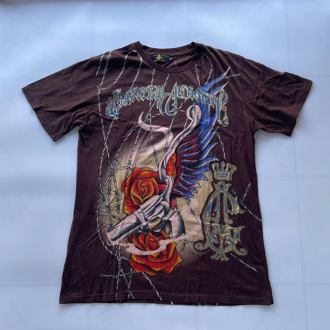 Christian Audigier Shirt (Category: Tshirts & Polo Shirts ) located in Davao. Submitted by archives_co. (Listing ID 1469544458, Image 1). Description: Good condition.