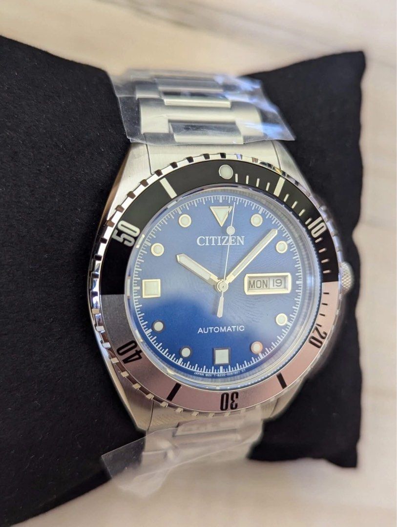 Citizen Sport NH7530-52M (Category: Men's Watches) located in Manila. Submitted by seikowatchfactory (Listing ID 1469427224, Image 2). Description: Model: NJ0200-50M Price: 18995 pesos Specifications: Case Size: 42mm Case Thickness: 13.5mm Lug-to-lug: 49mm Stainless Steel Case Caliber 8200 Automatic Movement with Hacking and Hand-winding mechanism Approx. 42 hours Power Reserve 100m Water Resistance Sapphire Crystal Weight: 173g Day/Date Fold Ove