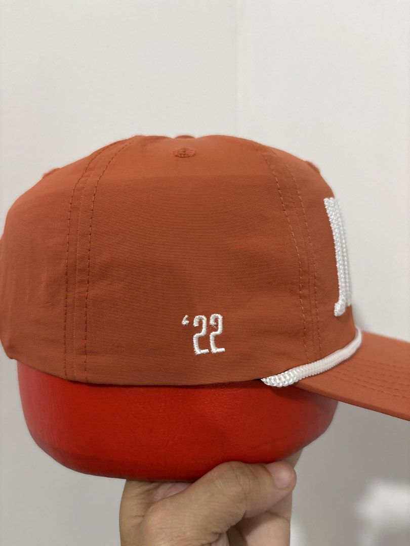 Claim Jumper '22 Orange Snapback Hat (Category: Caps & Hats) located in Calbayog City. Submitted by zaxcheus_castillo1708 (Listing ID 1469506800, Image 3). Description: - Brand: Claim Jumper (Est. 1996) - Color: Bright orange with white accents - Design: Bold embroidered 'JUMPER' lettering on front, small logo on left, '22 on right - Detail: Classic white rope across the brim - Closure: Adjustable white plastic snapback with woven tag - Condition