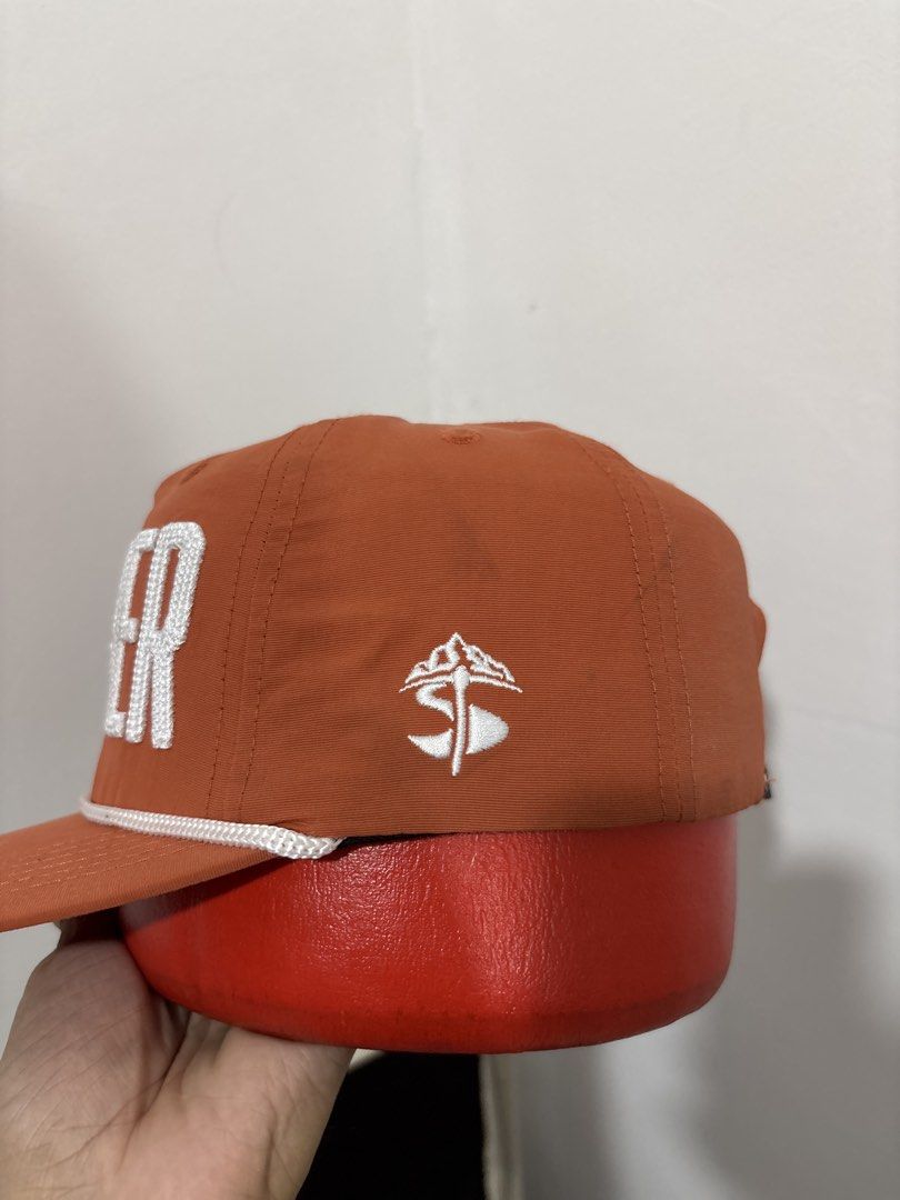 Claim Jumper '22 Orange Snapback Hat (Category: Caps & Hats) located in Calbayog City. Submitted by zaxcheus_castillo1708 (Listing ID 1469506800, Image 2). Description: - Brand: Claim Jumper (Est. 1996) - Color: Bright orange with white accents - Design: Bold embroidered 'JUMPER' lettering on front, small logo on left, '22 on right - Detail: Classic white rope across the brim - Closure: Adjustable white plastic snapback with woven tag - Condition
