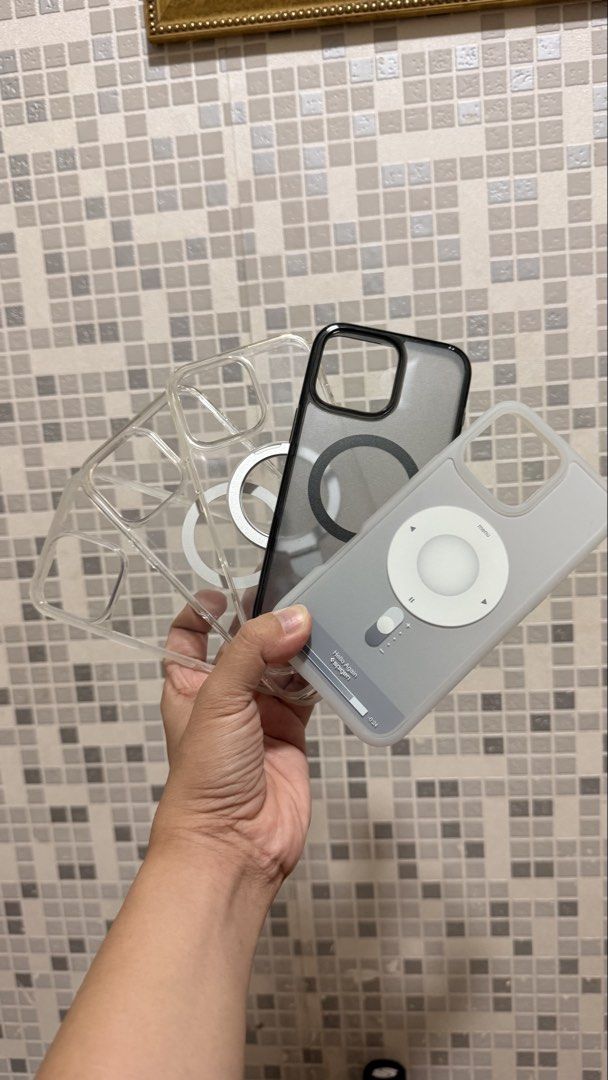 Clear phone cases Bundle 16 pro max (Category: Cases & Sleeves) located in Manila. Submitted by marixia (Listing ID 1469535064, Image 1). Description: - Compatible Model: iPhone 16 Pro Max - Bundle Inclusions: 4 different phone cases (Plain clear, retro iPod wheel design, clear MagFit case, and smoked black MagFit case) - Features: Built-in magnetic ring on selected cases, trendy designs, durable clear material - Condition: Brand new - Meet-up Lo