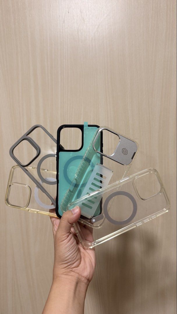 Clear Phone Cases Take all 16 Pro max (Category: Cases & Sleeves) located in Manila. Submitted by marixia (Listing ID 1469534720, Image 1). Description: -never been use yong iba. some still has protective stickers - Compatible Model: iPhone 16 Pro Max - Type: Clear phone cases (Take all bundle) - Features: MagSafe magnetic ring, camera lens slider protection, and integrated strap/stand - Material: Durable transparent TPU/PC - Condition: Excellent