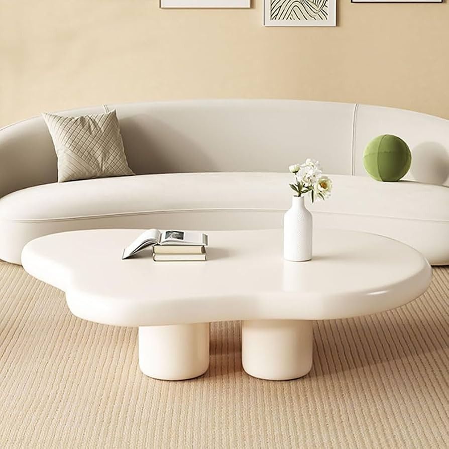 Cloud Coffee Table (Category: Coffee & Tea Tableware) located in Pasig City. Submitted by momofwillow (Listing ID 1469433215, Image 2). Description: Please note that this is NOT the lightweight, hollow, flimsy version commonly imported online. This is a very sturdy, heavy, and high-quality solid piece featuring thick cylindrical pillar legs and a beautiful matte cream/off-white finish. It is perfect for Nordic, Japandi, Wabi-Sabi, or minimalist l