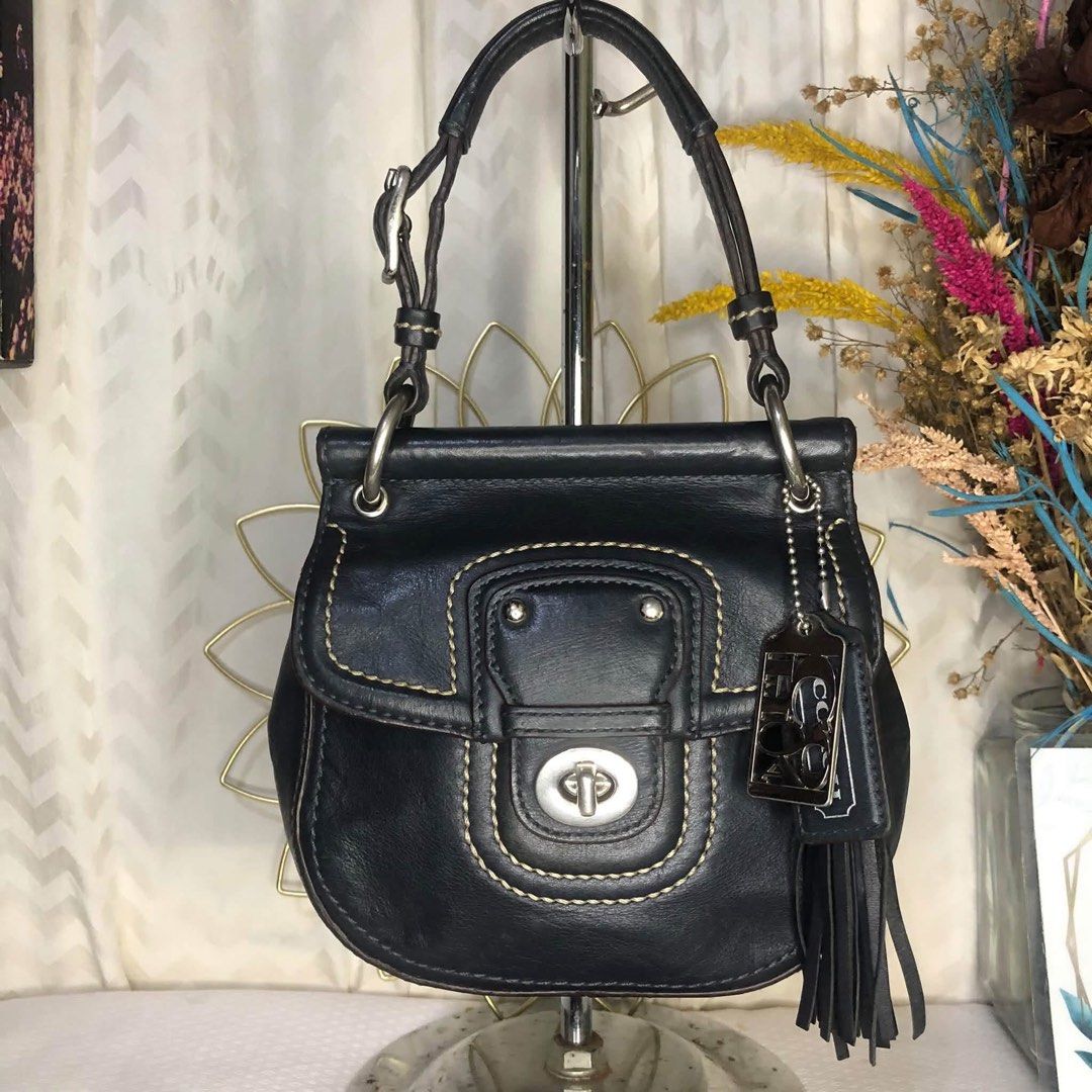 Coach legacy mini willis (Category: Cross-body Bags) located in Puerto Princesa. Submitted by mariasolidad (Listing ID 1469513483, Image 3). Description: 🔖Coach Legacy Mini Willis 📍Guaranteed authentic 📍Limited edition! Coach 70th anniversary collection. 📍There are normal signs of wear on the long strap's rubber lining, and minimal, washable dirt on the interior..