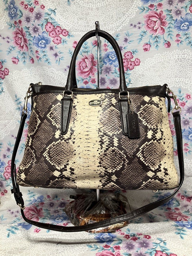 COACH PYTHON MORGAN SATCHEL BAG (Category: Cross-body Bags) located in General Mariano Alvarez. Submitted by adonid (Listing ID 1469411670, Image 1). Description: COACH PYTHON MORGAN SATCHEL BAG GOOD CONDITION NORMAL SIGN OF USAGE ONLY CROSSBODY/HAND/SHOULDER BAG.