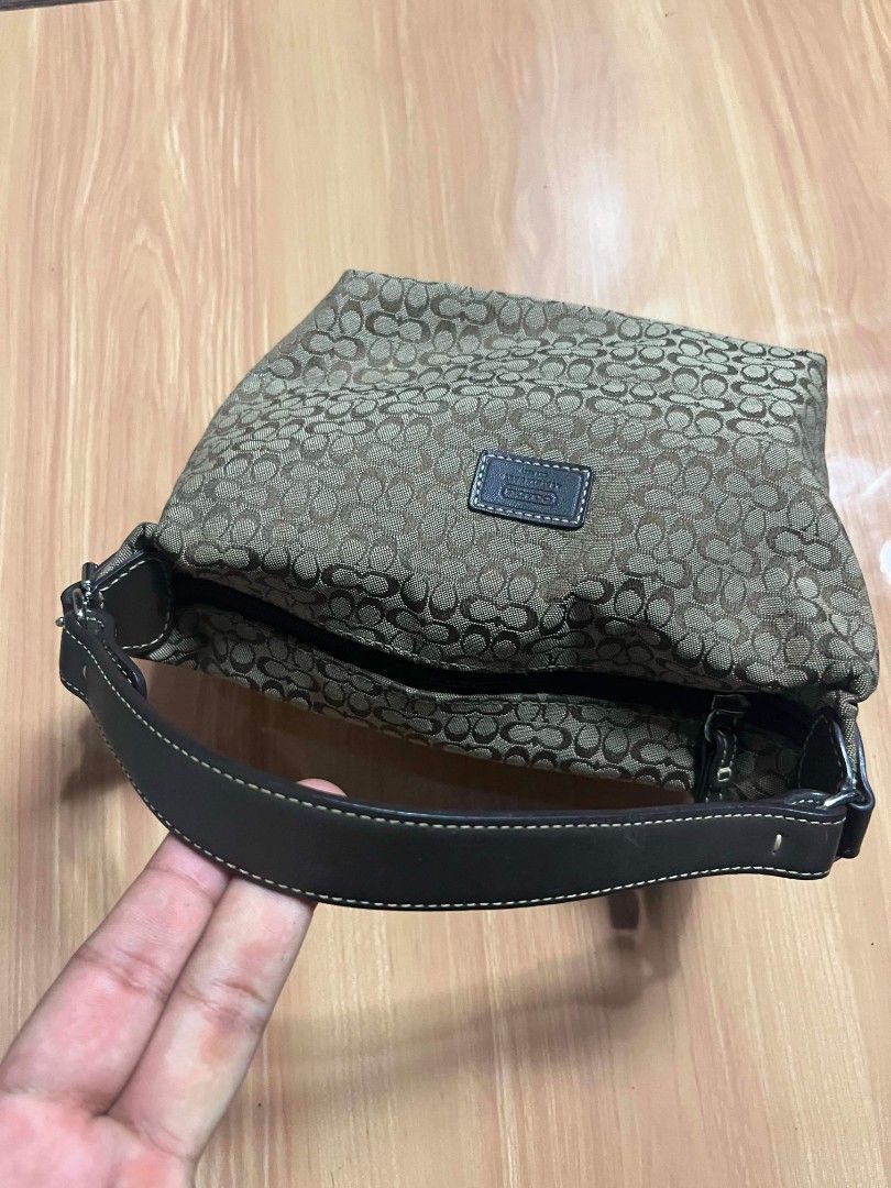 Coach Signature C Monogram Hobo Mini Bag (Category: Luxury Bags & Wallets) located in Manila. Submitted by senggggg. (Listing ID 1469403242, Image 3). Description: good condition as new working zip no hidden issue .