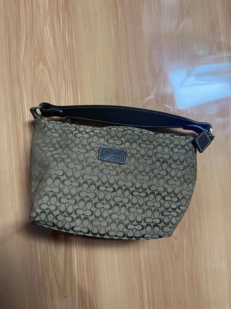 Coach Signature C Monogram Hobo Mini Bag (Category: Luxury Bags & Wallets) located in Manila. Submitted by senggggg. (Listing ID 1469403242, Image 2). Description: good condition as new working zip no hidden issue .