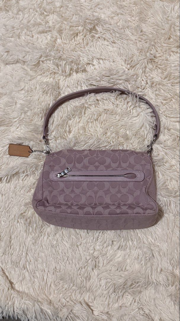 Coach Soft Tabby Shoulder Bag (Category: Luxury Bags & Wallets) located in Pasay City. Submitted by erinsclosetph (Listing ID 1469431303, Image 2). Description: Beautiful lavender Coach Soft Tabby Shoulder Bag in excellent pre-loved condition. Canvas is in good condition, and hardware remains tarnish-free. Minor stain in the inner lining. .