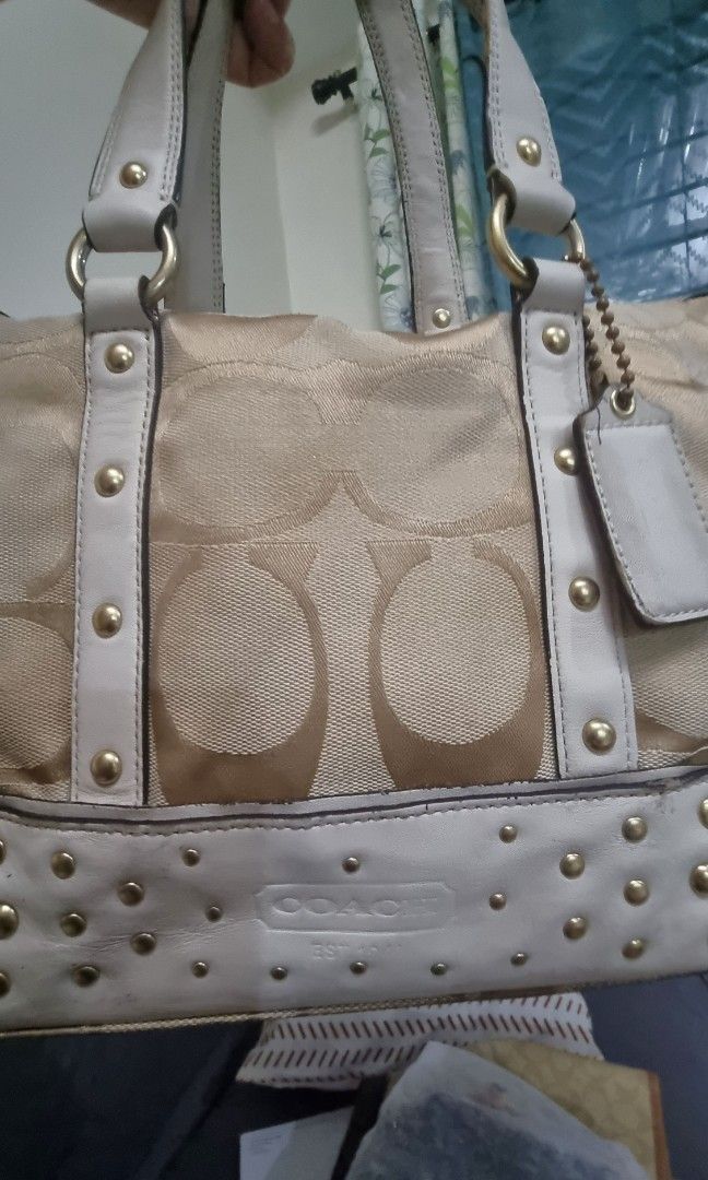 Coach Studded 2way Bag (Category: Shoulder Bags) located in Manila. Submitted by shopaholicmimi (Listing ID 1469553559, Image 3). Description: preloved with flaws with strap dirt, rubber lining rubs, has open piping, no more zipper pull not vintage, legacy, demi, demi, carly, ergo, soho, choco, rare, zoe, eastwest, patch.
