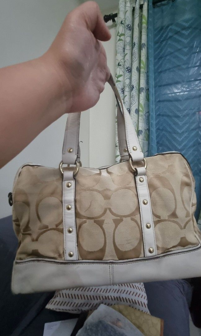 Coach Studded 2way Bag (Category: Shoulder Bags) located in Manila. Submitted by shopaholicmimi (Listing ID 1469553559, Image 2). Description: preloved with flaws with strap dirt, rubber lining rubs, has open piping, no more zipper pull not vintage, legacy, demi, demi, carly, ergo, soho, choco, rare, zoe, eastwest, patch.