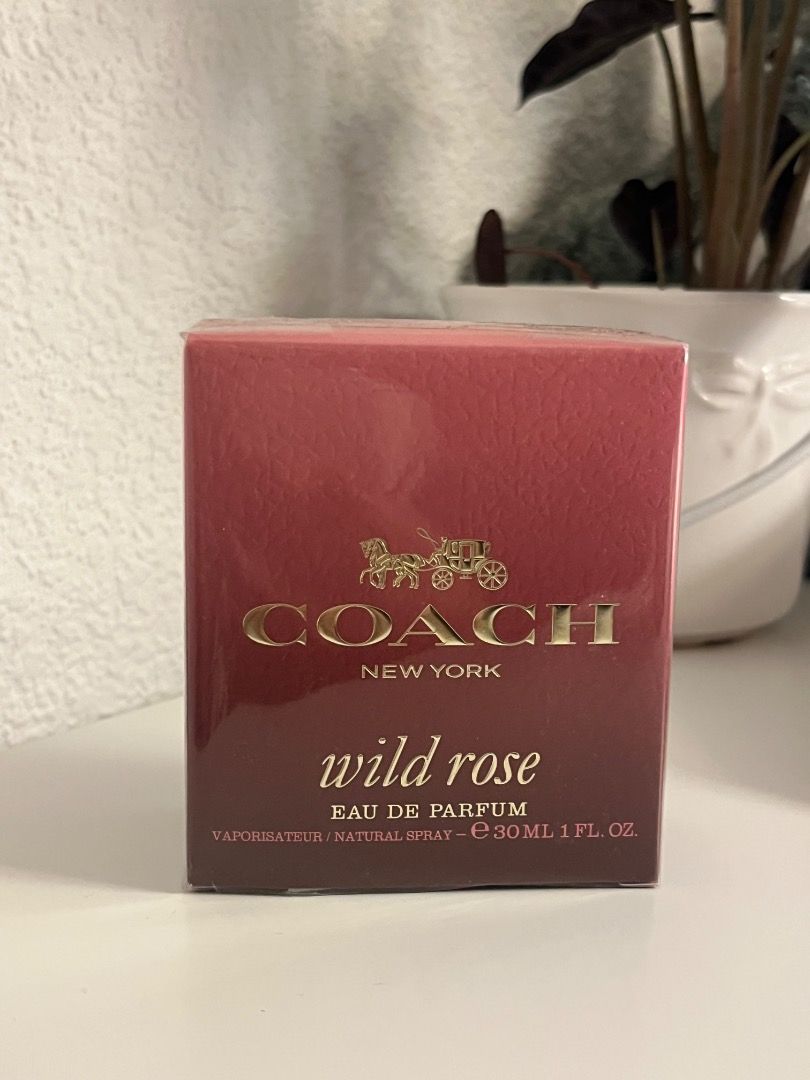 Coach Wild Rose Eau De Parfum 30ml (Category: Fragrance & Deodorants) located in Santa Rosa. Submitted by violetmarkeyy (Listing ID 1469568272, Image 1). Description: - Product: Coach Wild Rose Eau de Parfum - Size: 30 ml (Natural Spray Vaporizer) - Condition: Brand new, unopened, and still wrapped in original clear plastic - Authenticity: Bottom of the box includes barcode and batch code details - From Germany - ETA mid November 2026.