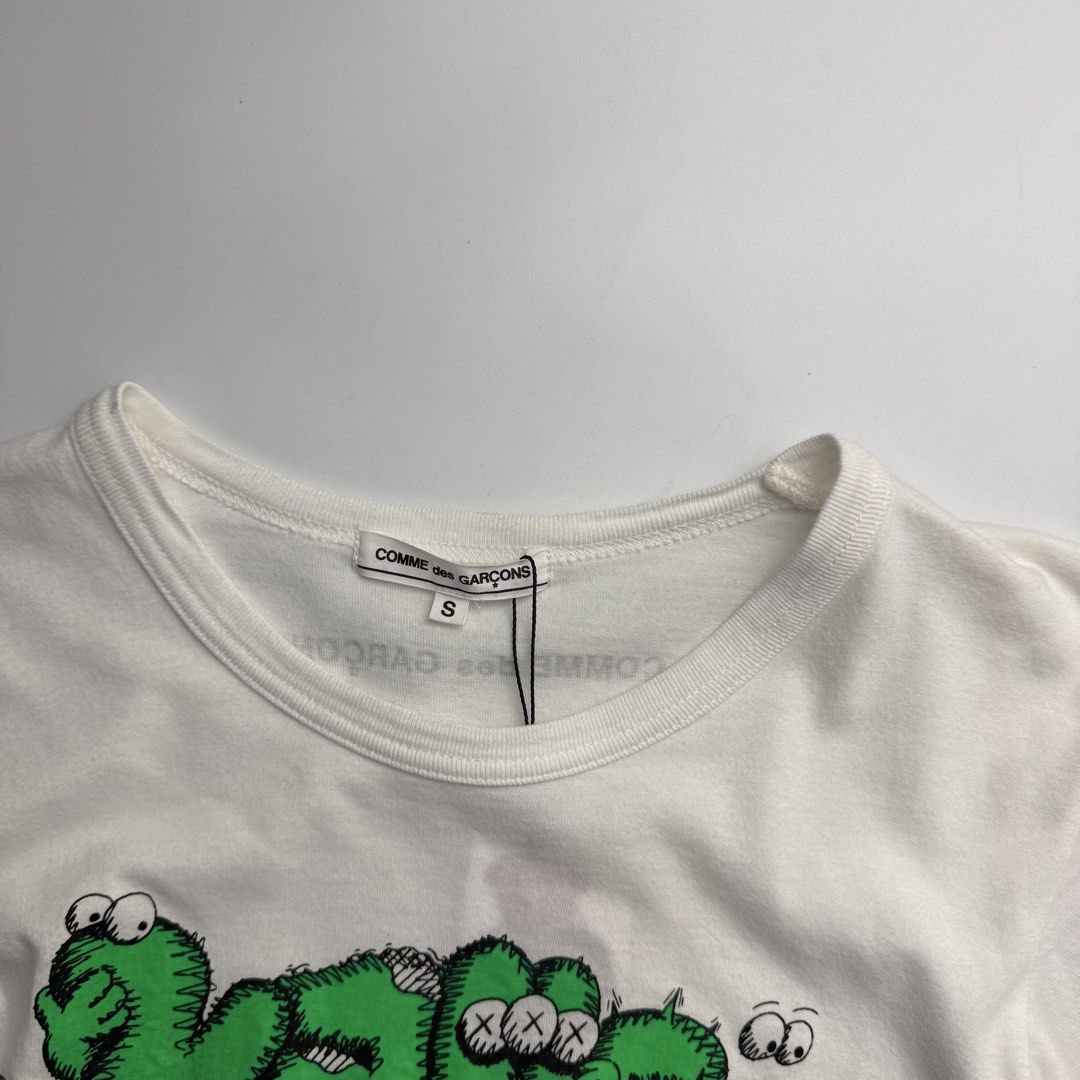 Comme des Garcon x Kaws (Category: Shirts) located in Quezon City. Submitted by beastmnl (Listing ID 1469510324, Image 3). Description: Dimension 15 width 24 length .
