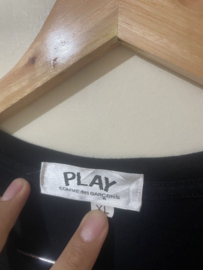 COMME des GARÇONS PLAY Black Heart Tee (Category: Activewear) located in Davao. Submitted by thegraildept2026 (Listing ID 1469415745, Image 3). Description: - Brand: COMME des GARÇONS PLAY - Color: Black - Size: Extra Large (XL) - Material: 100% Cotton - Details: Iconic embroidered red heart patch on chest, crew neckline, short sleeves - Fit: Standard fit - Condition: Clean front and back with no rear graphics.
