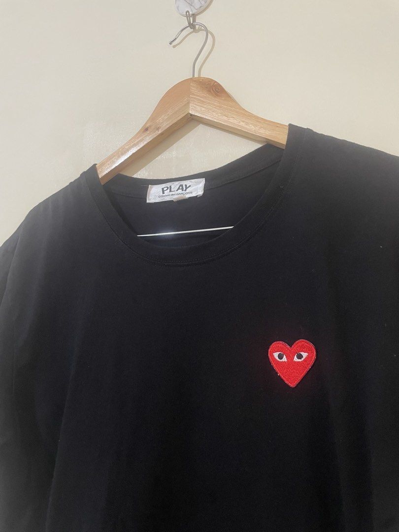 COMME des GARÇONS PLAY Black Heart Tee (Category: Activewear) located in Davao. Submitted by thegraildept2026 (Listing ID 1469415745, Image 2). Description: - Brand: COMME des GARÇONS PLAY - Color: Black - Size: Extra Large (XL) - Material: 100% Cotton - Details: Iconic embroidered red heart patch on chest, crew neckline, short sleeves - Fit: Standard fit - Condition: Clean front and back with no rear graphics.