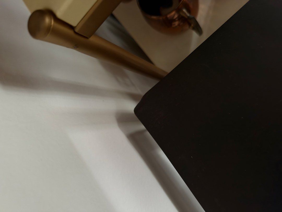 Console table (Category: Tables & Sets) located in Singapore. Submitted by superrrbbbbb (Listing ID 1469406805, Image 2). Description: Alcohol not included - Type: Console table - Material: black metal/iron frame Measurement: 122cm (L) x 77cm (H) 20cm (D) - Storage: Open bottom shelf - Placement: Fits perfectly behind a sofa or against an entryway wall - Condition: Some wear and tear along the edges (the look is industrial so there’s some marks a