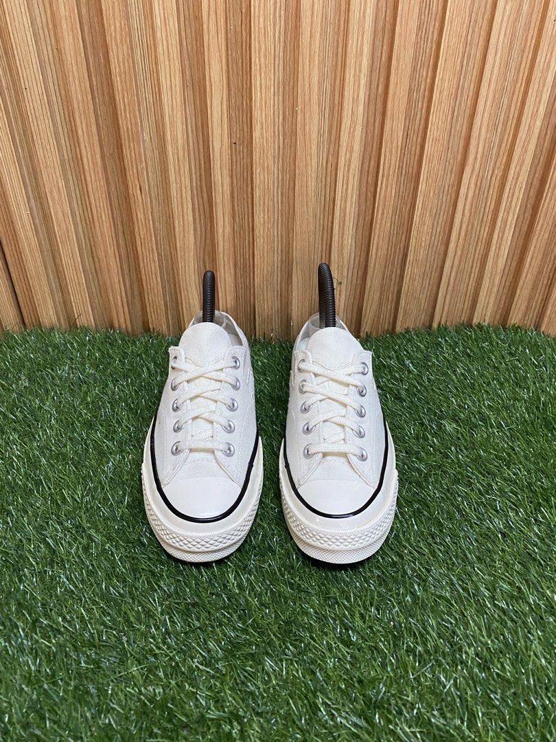 Converse Chuck 70 Mule Low Canvas Off White (Category: Sneakers) located in Butuan. Submitted by chang_14 (Listing ID 1469502110, Image 2). Description: - Model: Converse Chuck 70 Mule Slip-On - Color: Off-white canvas upper with black pinstripe midsole - Size: US Men's 5 / Women's 7, UK 5, EUR 37.5 - Condition: Clean overall, minimal wear on soles - Features: Classic low-top mule design with durable brown rubber outsole.