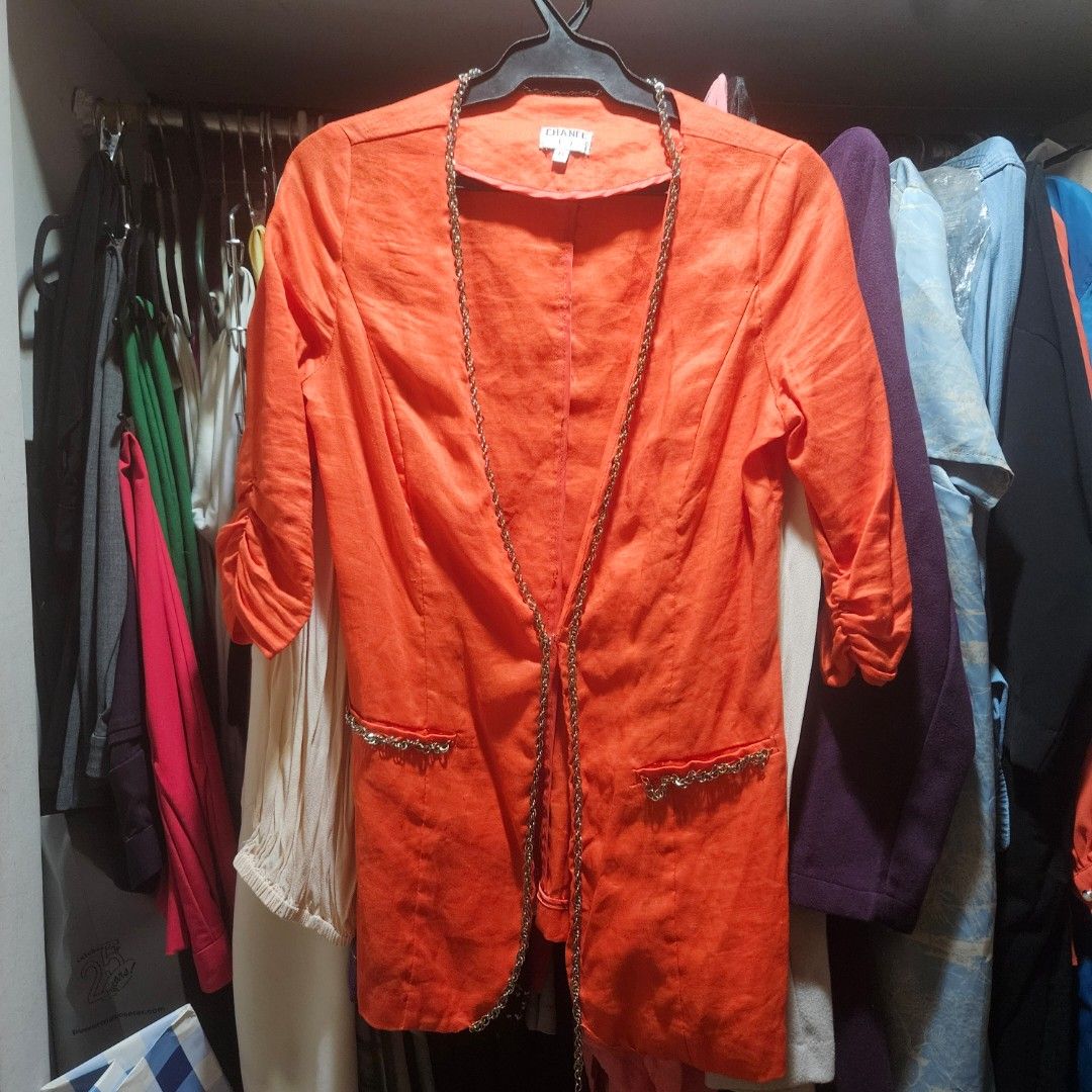 CORAL-ORANGE LINEN LONGLINE BLAZER (Category: Coats, Jackets and Outerwear) located in Manila. Submitted by smartluxeph (Listing ID 1469542553, Image 2). Description: 🧡 CORAL-ORANGE LINEN LONGLINE BLAZER / COVER-UP 🧡 💰 ₱850 | Size M | UNUSED A vibrant statement piece that's classy and easy to dress up! ✨ 🌸 65% linen, 35% cotton — breathable and comfortable ✨ Beautiful gold-tone chain accents along the front and pockets 🧡 Stylish ruched 3/4 s
