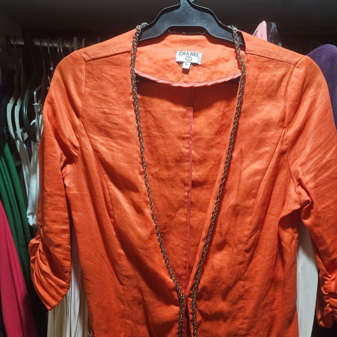 CORAL-ORANGE LINEN LONGLINE BLAZER (Category: Coats, Jackets and Outerwear) located in Manila. Submitted by smartluxeph (Listing ID 1469542553, Image 3). Description: 🧡 CORAL-ORANGE LINEN LONGLINE BLAZER / COVER-UP 🧡 💰 ₱850 | Size M | UNUSED A vibrant statement piece that's classy and easy to dress up! ✨ 🌸 65% linen, 35% cotton — breathable and comfortable ✨ Beautiful gold-tone chain accents along the front and pockets 🧡 Stylish ruched 3/4 s