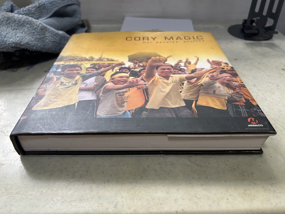 Cory Magic Her Peoples Stories Hardcover Book (Category: Storybooks) located in Marikina City. Submitted by traxwap (Listing ID 1469420000, Image 2). Description: - Hardcover commemorative book: Cory Magic Her People's Stories - Focuses on the events surrounding the passing of Corazon Aquino in August 2009 - Filled with powerful photographs and firsthand stories from witnesses and photographers - Special publication involving Meralco and ABS-CBN 