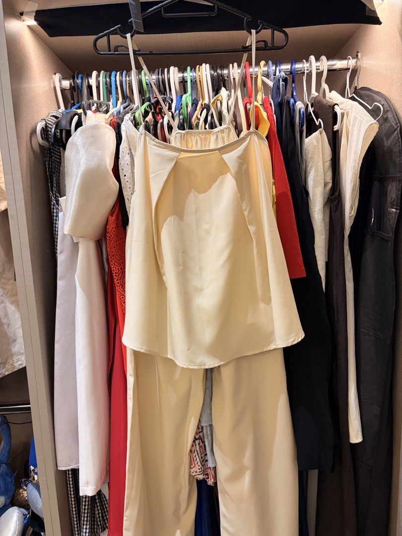 Cream Spaghetti Strap Top And Pants Set (Category: Sets or Coordinates) located in Makati City. Submitted by samfanny07845 (Listing ID 1469492224, Image 1). Description: - Color: Cream - Set includes: Spaghetti strap top with draped front overlay and matching long trousers - Fabric: Lightweight with a smooth, premium finish - Style: Simple, chic, and versatile for casual wear or dressed-up occasions - Versatility: Easy to mix and match separately