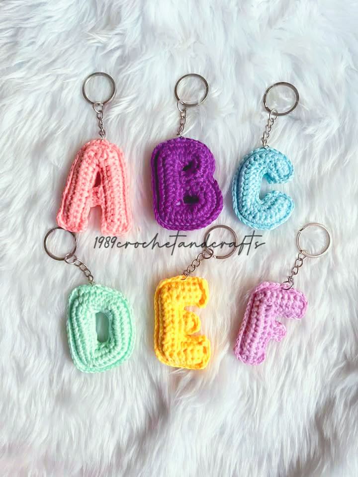 Crochet Letter Keychains (Category: Handmade Craft) located in Caloocan City. Submitted by 1989crochetandcrafts (Listing ID 1469435734, Image 1). Description: - Handmade crochet letter keychains (padded and carefully stitched) - Fully customizable: Choose your preferred letter and colors - Optional add-ons: Floral charms, pearl accents, and stylish tassels - Perfect for personalizing bags, keys, and lanyards - Send a message to place your custom 
