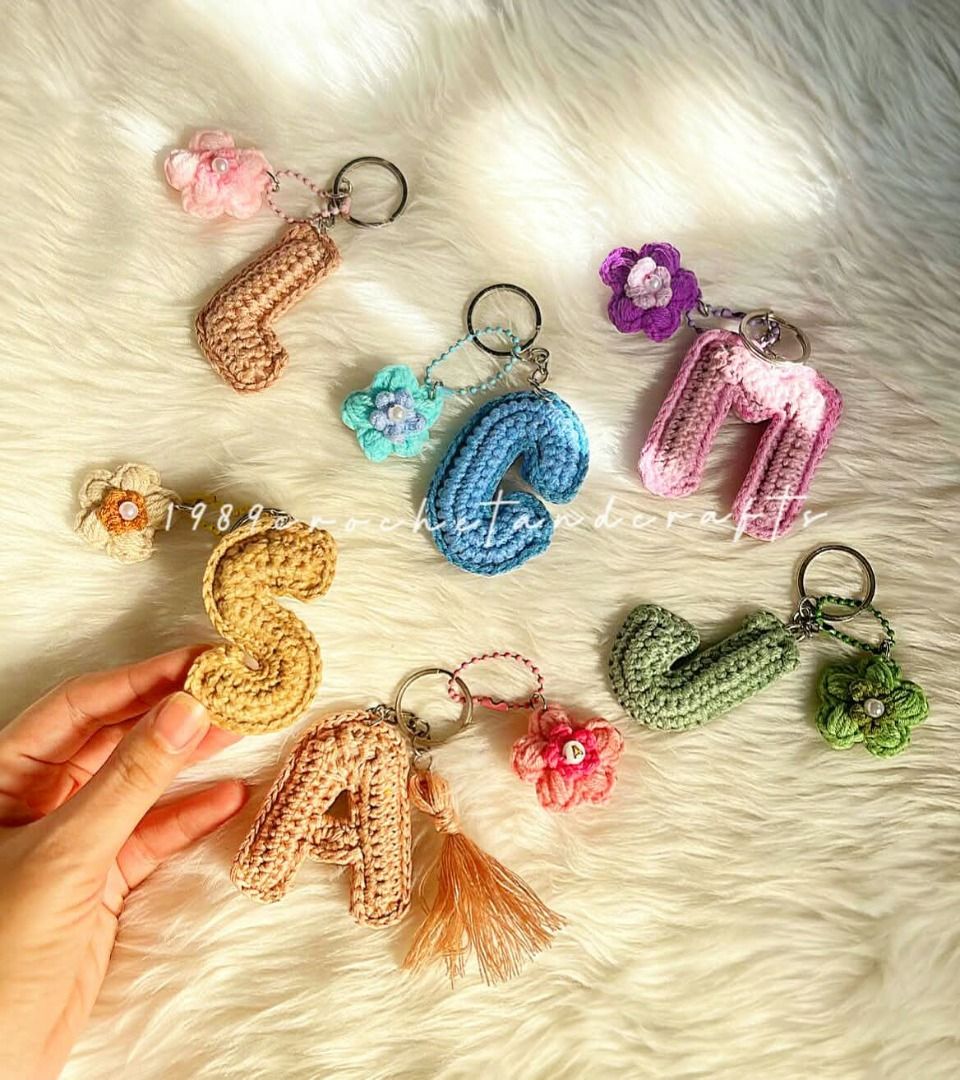 Crochet Letter Keychains (Category: Handmade Craft) located in Caloocan City. Submitted by 1989crochetandcrafts (Listing ID 1469435734, Image 3). Description: - Handmade crochet letter keychains (padded and carefully stitched) - Fully customizable: Choose your preferred letter and colors - Optional add-ons: Floral charms, pearl accents, and stylish tassels - Perfect for personalizing bags, keys, and lanyards - Send a message to place your custom 