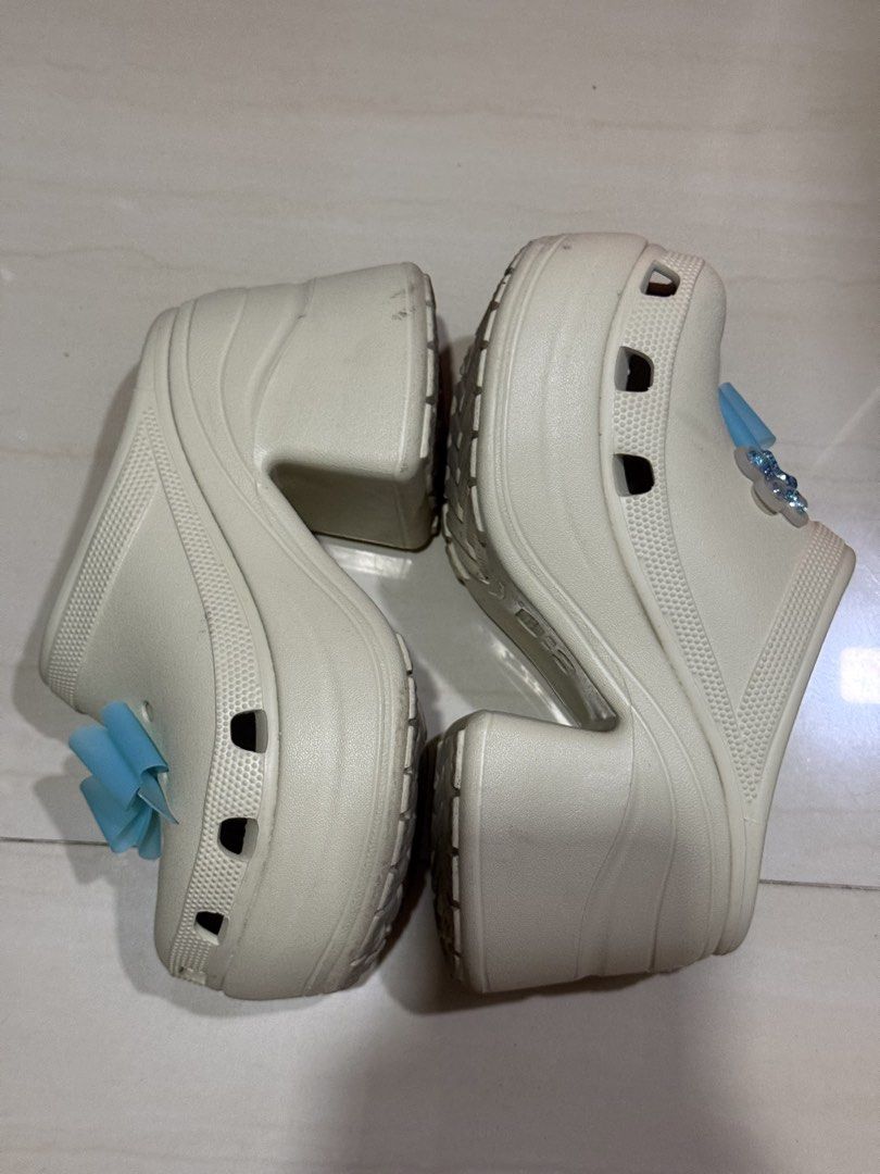 Crocs Bae Clog Platform Heels (Category: Flats & Sandals) located in Makati City. Submitted by buymystuffplsxoxo (Listing ID 1469558002, Image 2). Description: - Used a few times - Purchased from official orange app Crocs store - Size: Men's US 4 / Women's US 6 - Design: Chunky block heels and platform with ventilation holes - Comfort: Iconic Crocs comfort insole for all-day wear - Condition: Pre-owned (rated 7/10), soles show dirt and scuff mark
