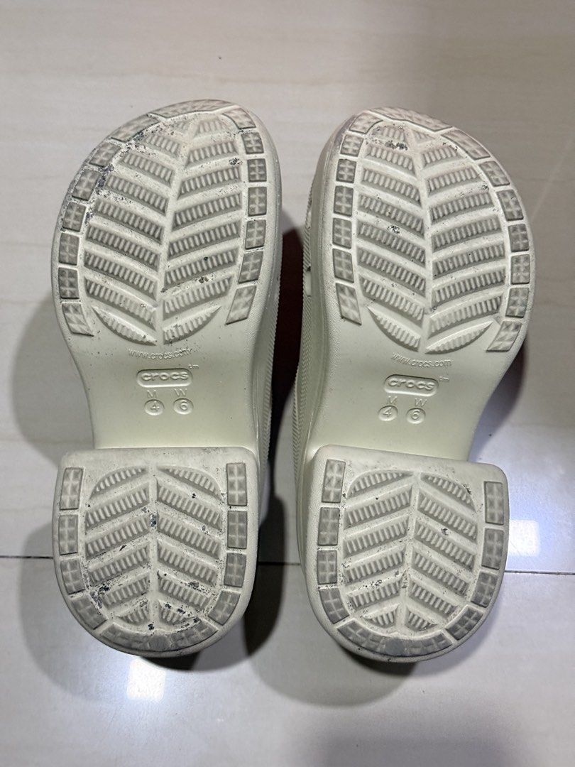 Crocs Bae Clog Platform Heels (Category: Flats & Sandals) located in Makati City. Submitted by buymystuffplsxoxo (Listing ID 1469558002, Image 3). Description: - Used a few times - Purchased from official orange app Crocs store - Size: Men's US 4 / Women's US 6 - Design: Chunky block heels and platform with ventilation holes - Comfort: Iconic Crocs comfort insole for all-day wear - Condition: Pre-owned (rated 7/10), soles show dirt and scuff mark