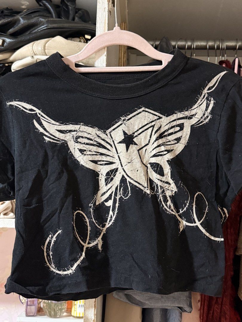 Cropped Angel Y2K Shirt (Category: Shirts) located in Lapu Lapu. Submitted by bzzzzarah (Listing ID 1469560357, Image 2). Description: A cropped angel shirt. Size small. Has visible discoloration at the back—no other issues other than that.