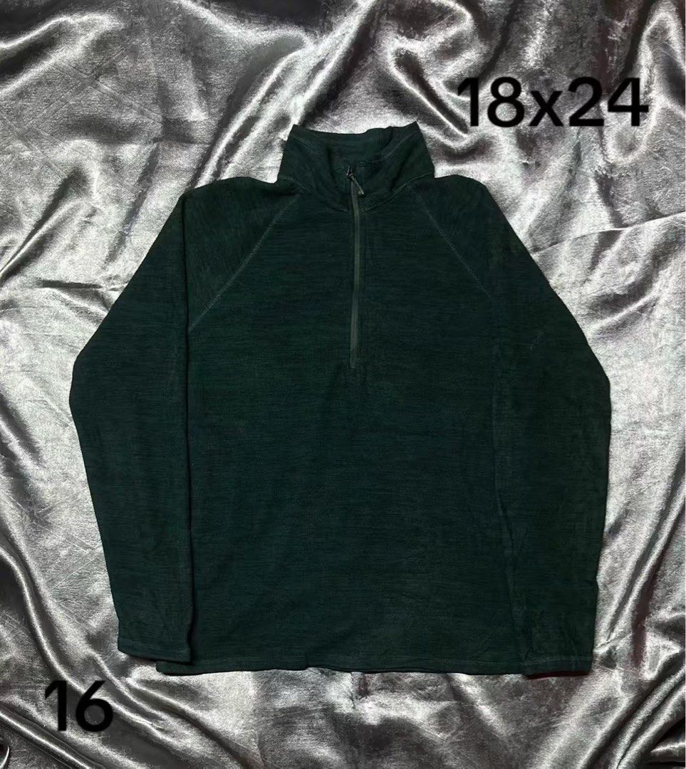 Dark Green Quarter Zip Pullover Sweater 18x24 (Category: Coats, Jackets and Outerwear) located in Cavite. Submitted by bellewii (Listing ID 1469446748, Image 1). Description: - Color: Dark green - Style: Quarter-zip pullover with stand-up collar - Material: Textured ribbed fabric - Fit/Measurements: 18 inches across the chest, 24 inches in length - Sleeves: Long raglan sleeves - Ideal for: Casual wear and cooler weather layering - Condition: Exce