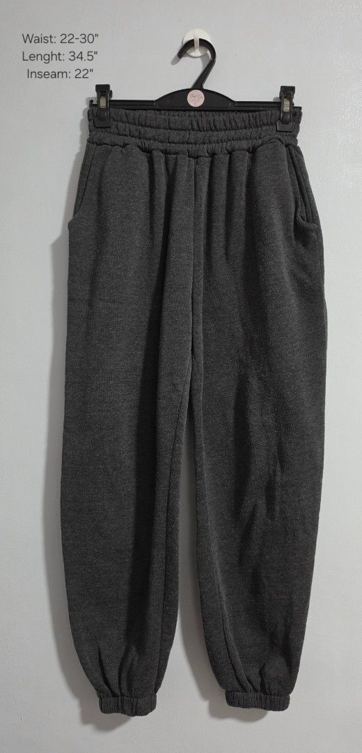 Dark Grey Jogger Sweatpants with Pockets and Cuffs (Category: Other Bottoms) located in Paranaque City. Submitted by franinnashop (Listing ID 1469457845, Image 1). Description: Declutter - Color: Dark grey - Material: Super comfy fleece, perfect for everyday wear - Waist: High elastic waistband (stretches 22-30 inches) - Pockets: Deep side pockets on both sides - Cuffs: Elastic cuffs at the ankles - Measurements: Length 34.5 inches, Inseam 22 inc