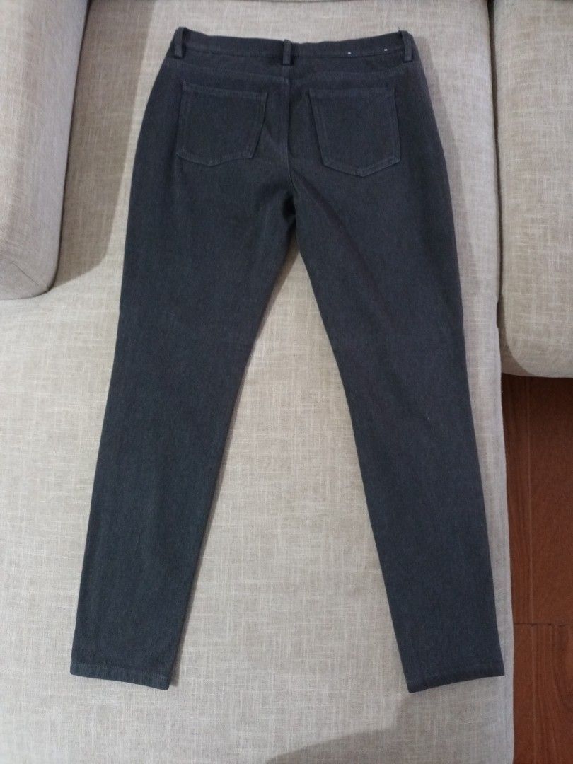 Dark Grey Slim Fit Stretch Pants (Category: Jeans) located in Quezon. Submitted by ja8720 (Listing ID 1469477115, Image 3). Description: - Color: Dark Grey - Fit: Slim fit, ankle length - Waist: Mid-rise with button closure and belt loops - Pockets: Two front scoop pockets, two back patch pockets - Material: Stretchy and comfortable fabric - Versatility: Easy to match for office or daily wear.