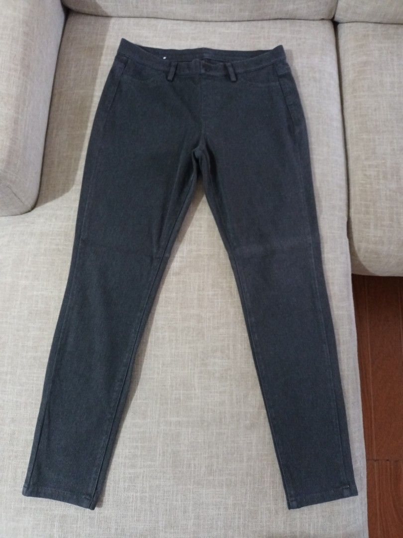 Dark Grey Slim Fit Stretch Pants (Category: Jeans) located in Quezon. Submitted by ja8720 (Listing ID 1469477115, Image 1). Description: - Color: Dark Grey - Fit: Slim fit, ankle length - Waist: Mid-rise with button closure and belt loops - Pockets: Two front scoop pockets, two back patch pockets - Material: Stretchy and comfortable fabric - Versatility: Easy to match for office or daily wear.